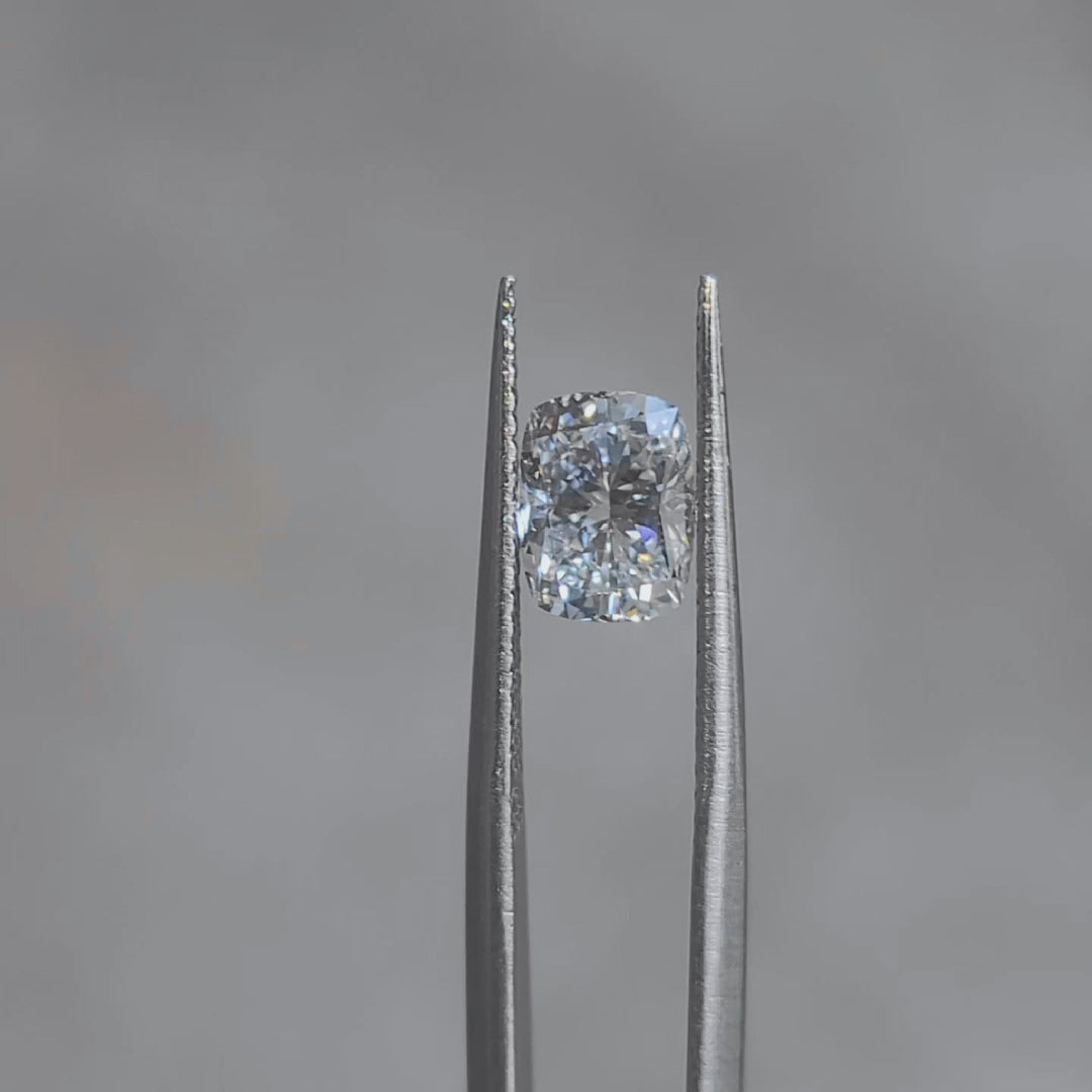 Sunlit video showcasing 1.52ct cushion E color SI1 diamond's facets