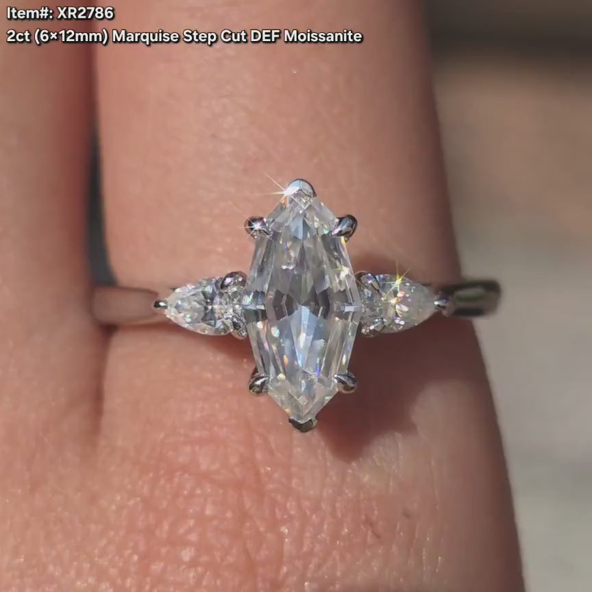 DovEggs marquise side stones hidden halo moissanite engagement ring in sunlight