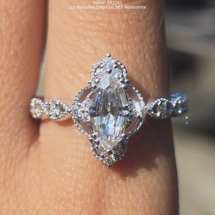 DovEggs 1ct Marquise Step cut moissanite ring sparkling in sunlight video