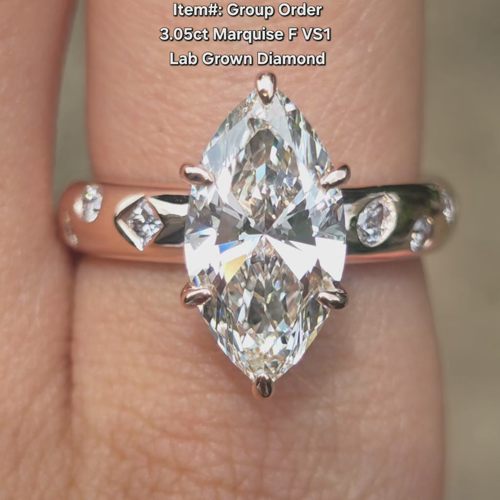 DovEggs Marquise art deco lab diamond engagement ring in sunlight