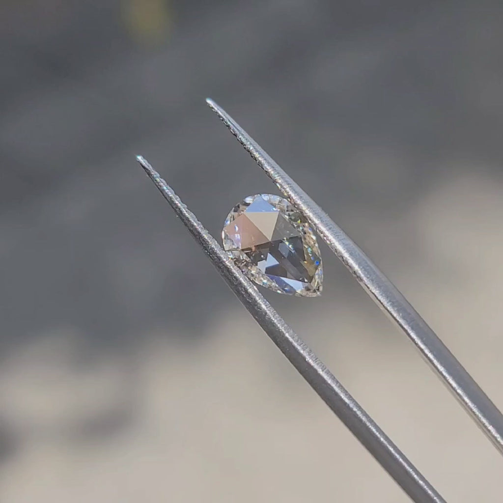 1.68ct Pear Rose Cut diamond’s delicate sparkle in sunlight