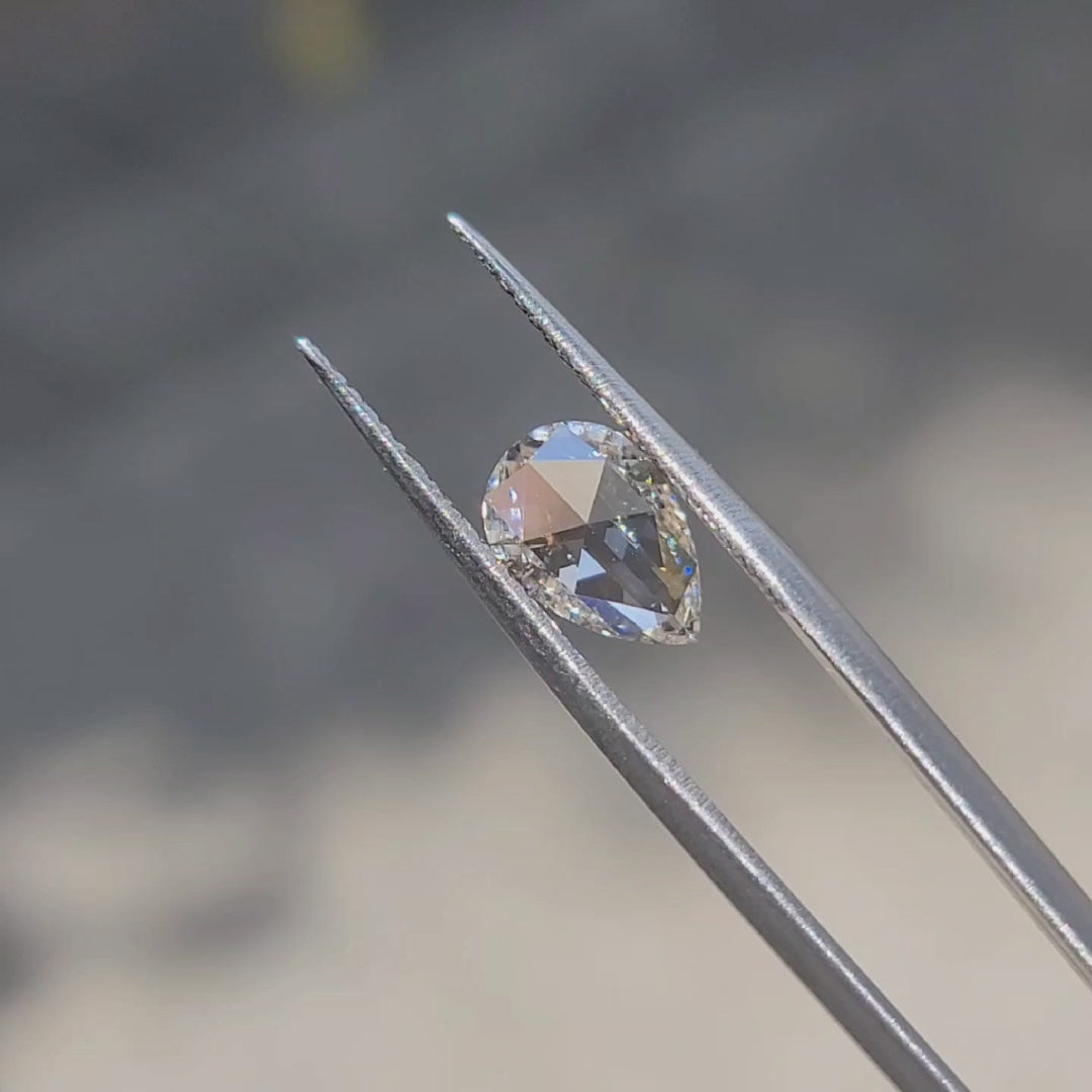 1.68ct Pear Rose Cut diamond’s delicate sparkle in sunlight