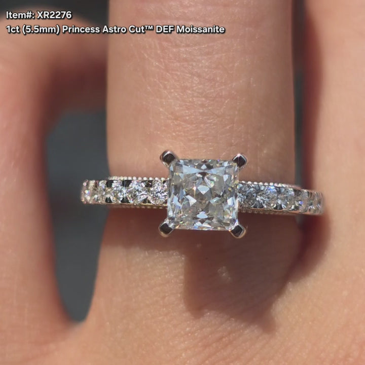 DovEggs Princess Astro cut moissanite ring sparkling in sunlight video.