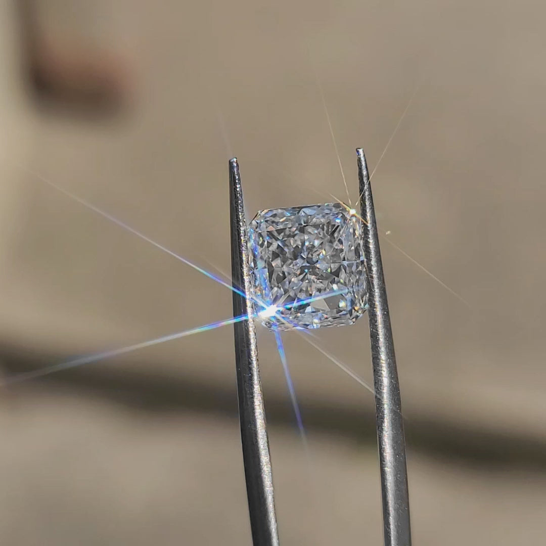 3.02ct radiant lab diamond (D/VVS1) outdoors, displaying fiery brilliance