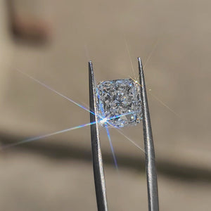 3.02ct radiant lab diamond (D/VVS1) outdoors, displaying fiery brilliance