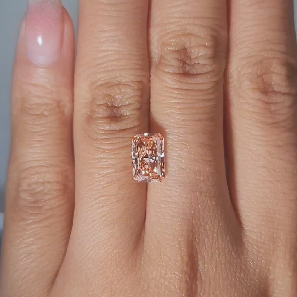 Warm indoor lighting video of the diamond on hand display