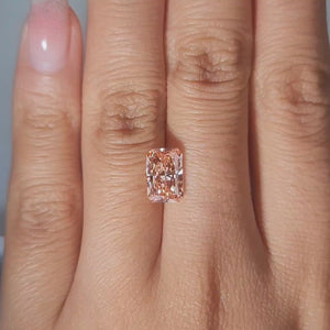Warm indoor lighting video of the diamond on hand display