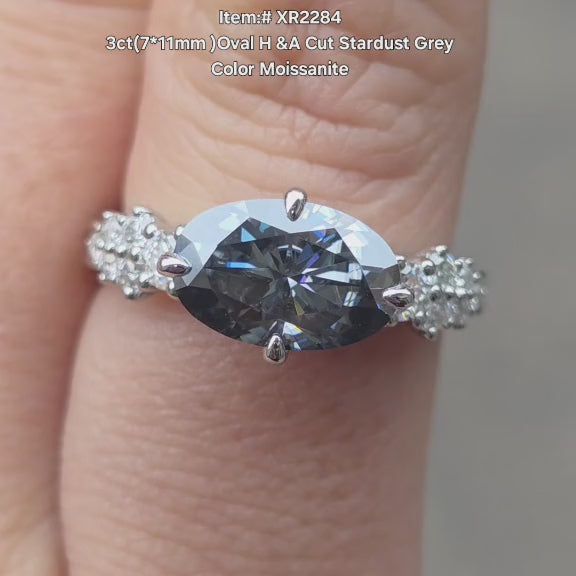 DovEggs Oval stardust grey color moissanite ring sparkling on hand video.