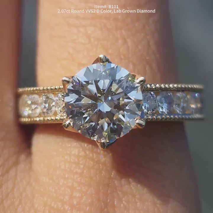 DovEggs round full eternity channel set lab diamond engagement ring video in sunlight