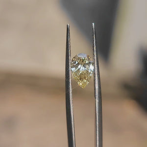 Sunlit video capturing 1.24ct pear yellow diamond's color gradient