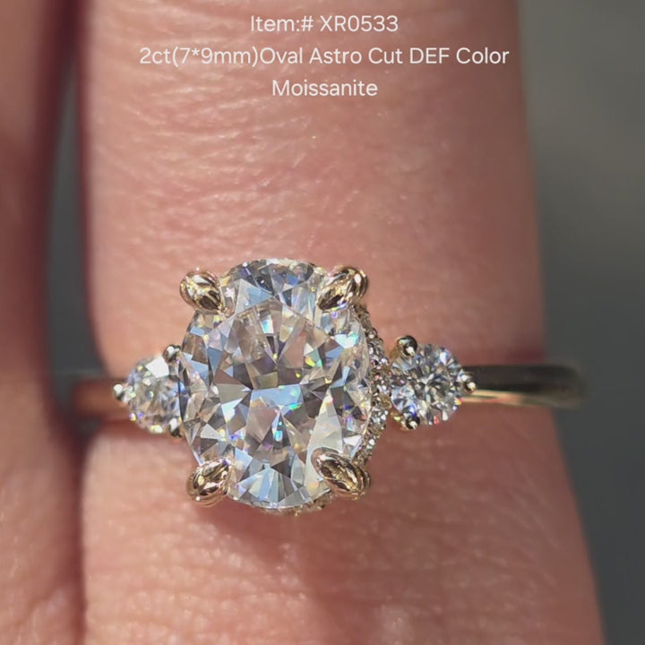Oval Astro cut moissanite ring sparkling in sunlight video.