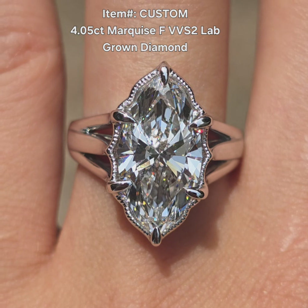 DovEggs marquise split shanks vintage lab diamond engagement ring in sunlight