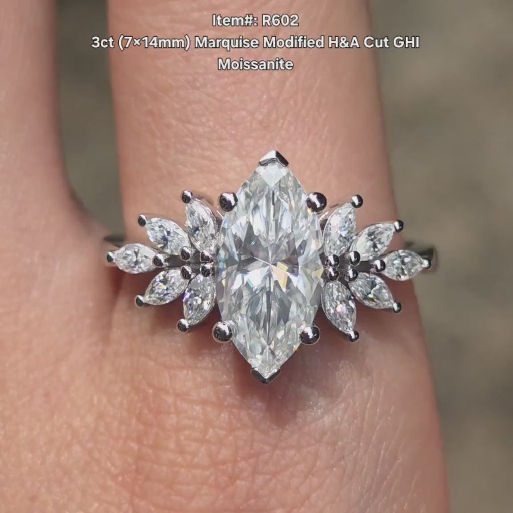 DovEggs marquise side stones moissanite engagement ring video