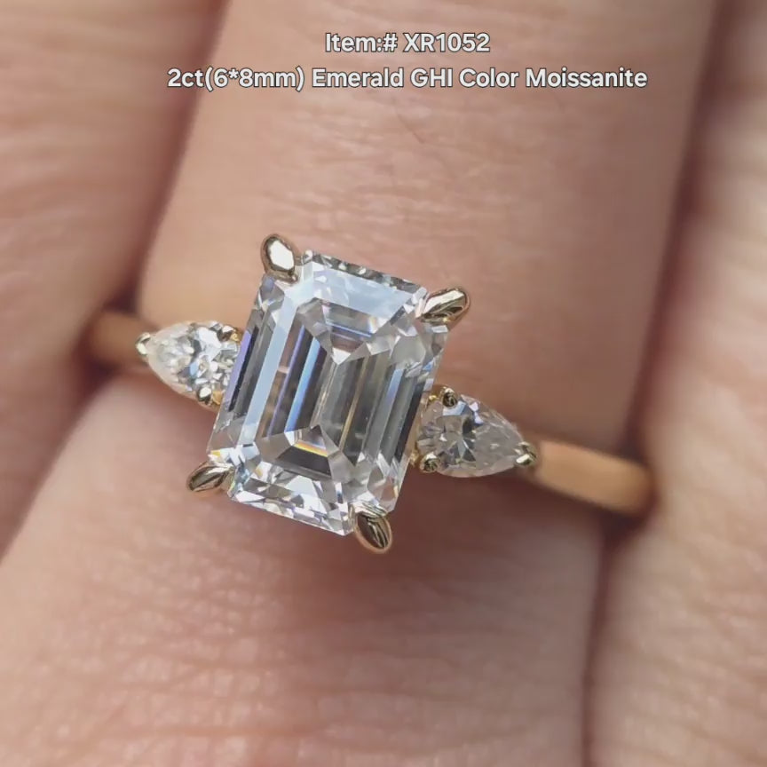 DovEggs emerald moissanite ring sparkling in sunlight video.