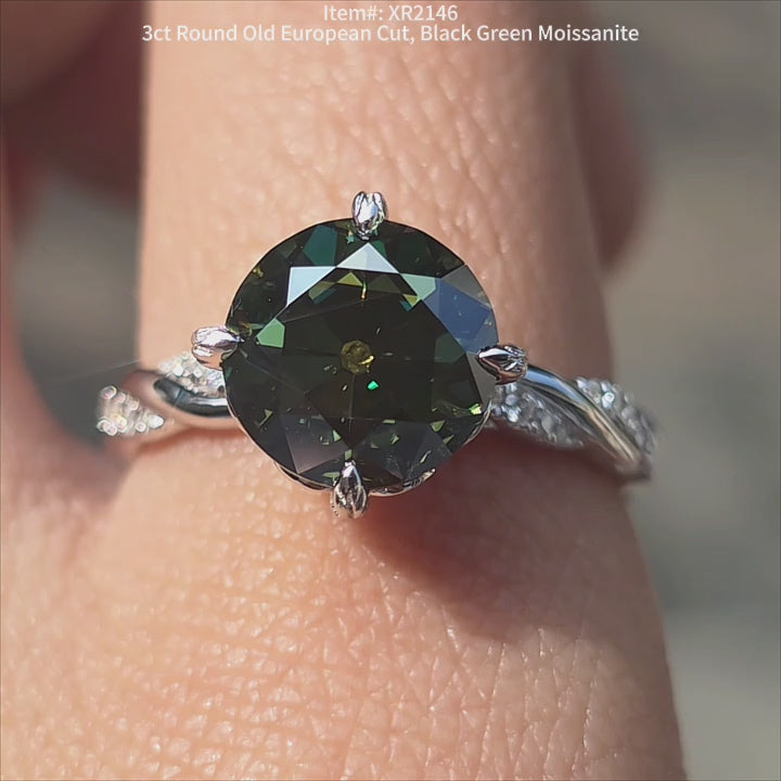 DovEggs OEC Round black green moissanite engagement in sunlighting