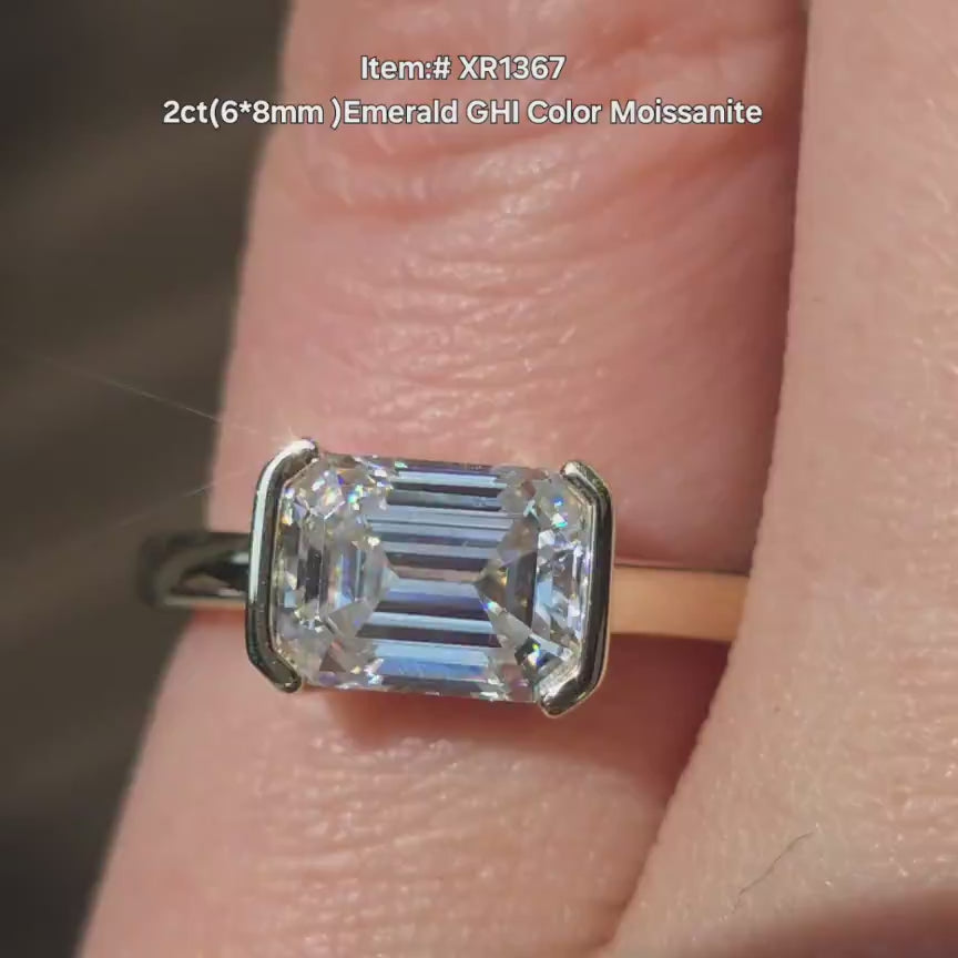 DovEggs solitaire emerald moissanite engagement ring in sunlight video