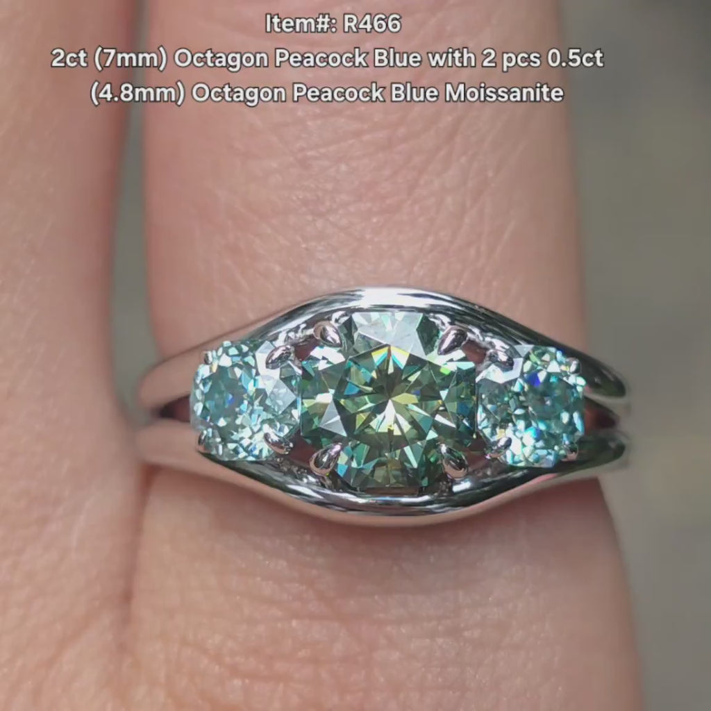 DovEggs octagon split shanks three stones peacock blue moissanite engagement ring video