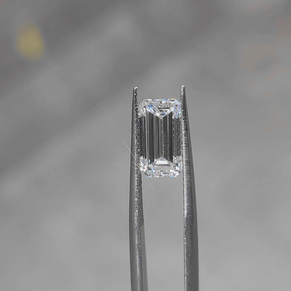 3.02ct emerald lab diamond (D/VVS1) in direct sunlight, displaying mirror-like facets