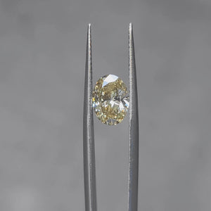 Sunlit video capturing 2.005ct oval vivid yellow diamond's fire