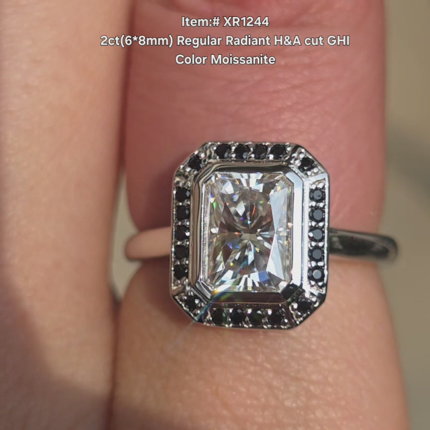 DovEggs radiant H&A cut GHI color moissanite ring sparkling in sunlight video.