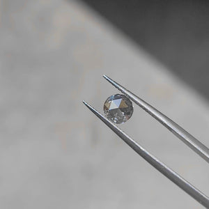 1.01ct Round Rose Cut Lab Diamond (E/VS1) sparkling in natural sunlight