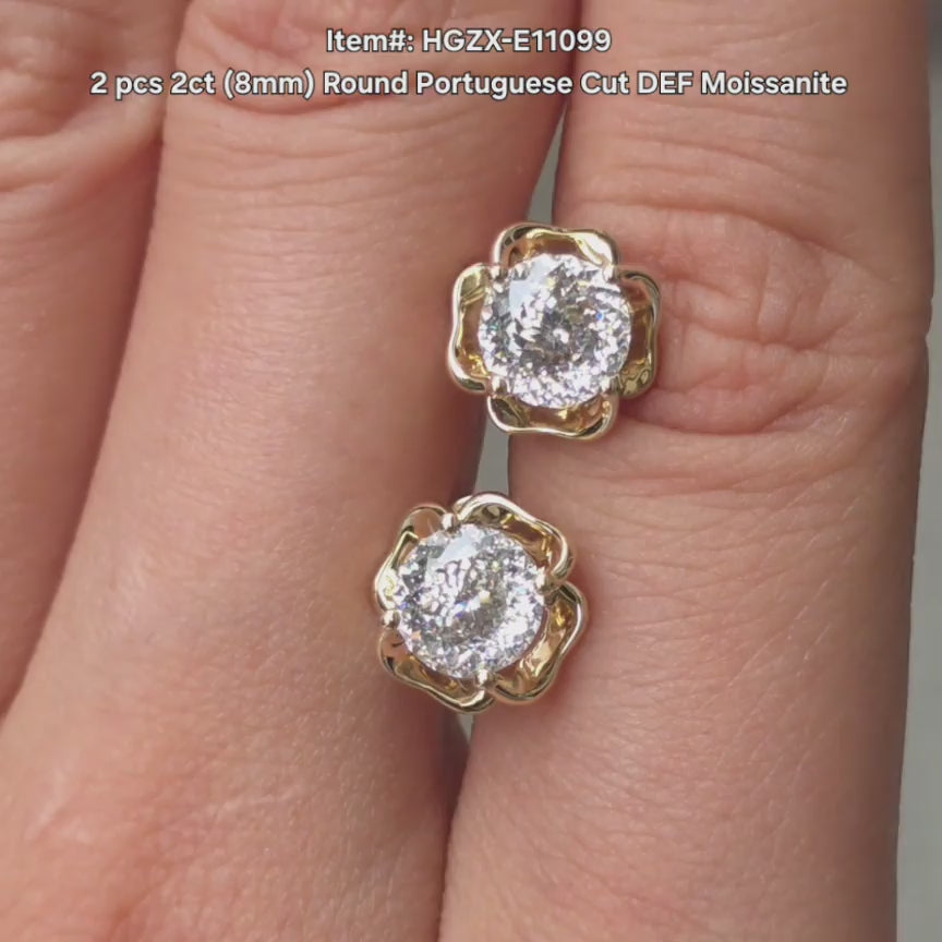 DovEggs 2ct Round Portuguese cut moissanite earrings sparkling in sunlight video.