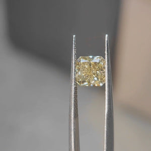 2.30ct radiant cut vivid yellow diamond's crushed ice effect in sun
