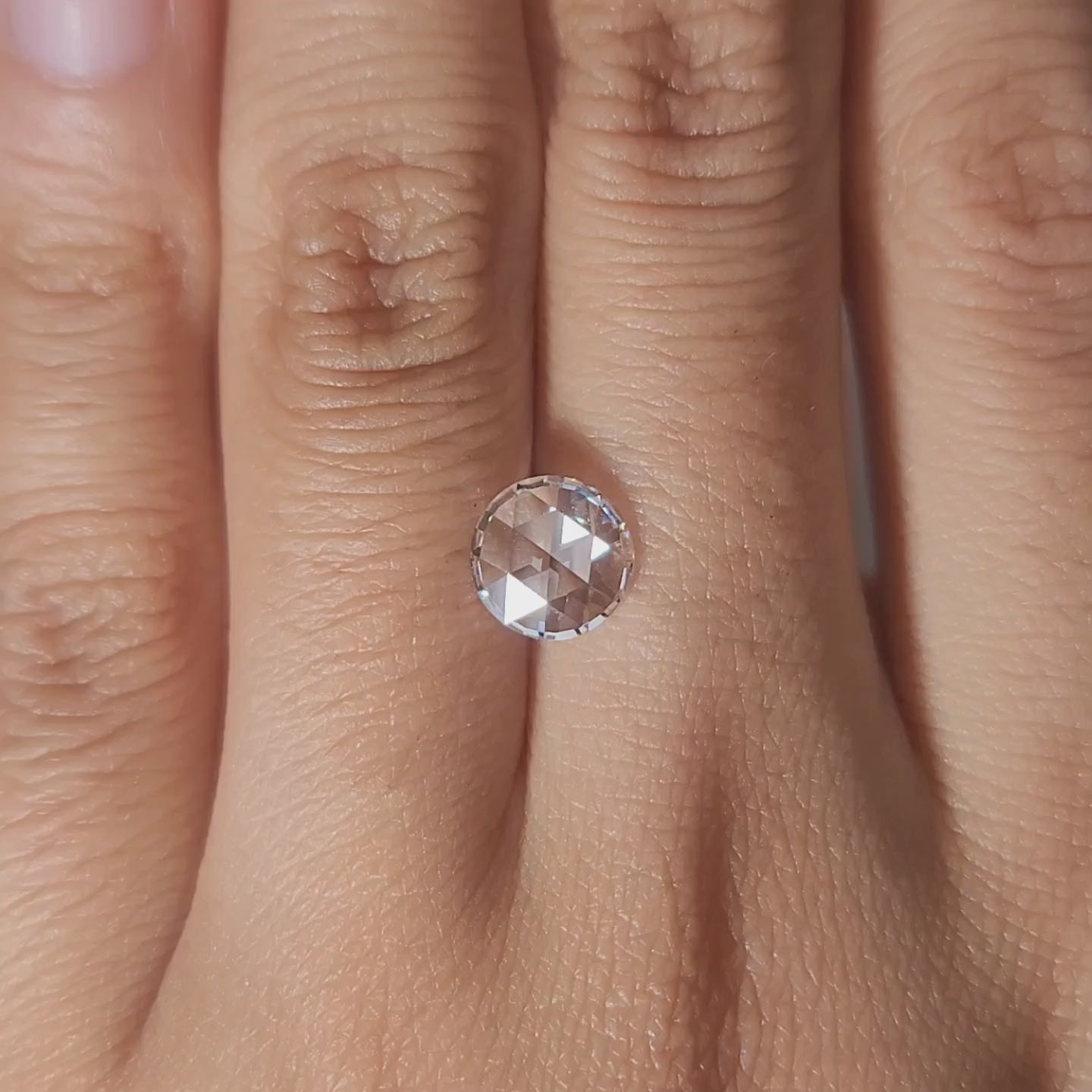 video of 1.3ct rose diamond in warm light