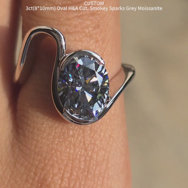DovEggs oval twist bezel solitaire smokey spark grey moissanite engagement ring video