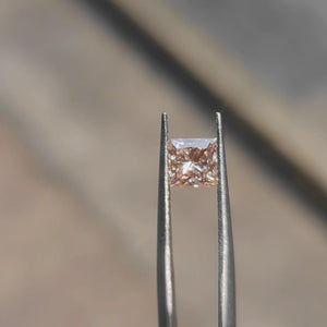 Sunlit video of princess cut's sharp pink reflections