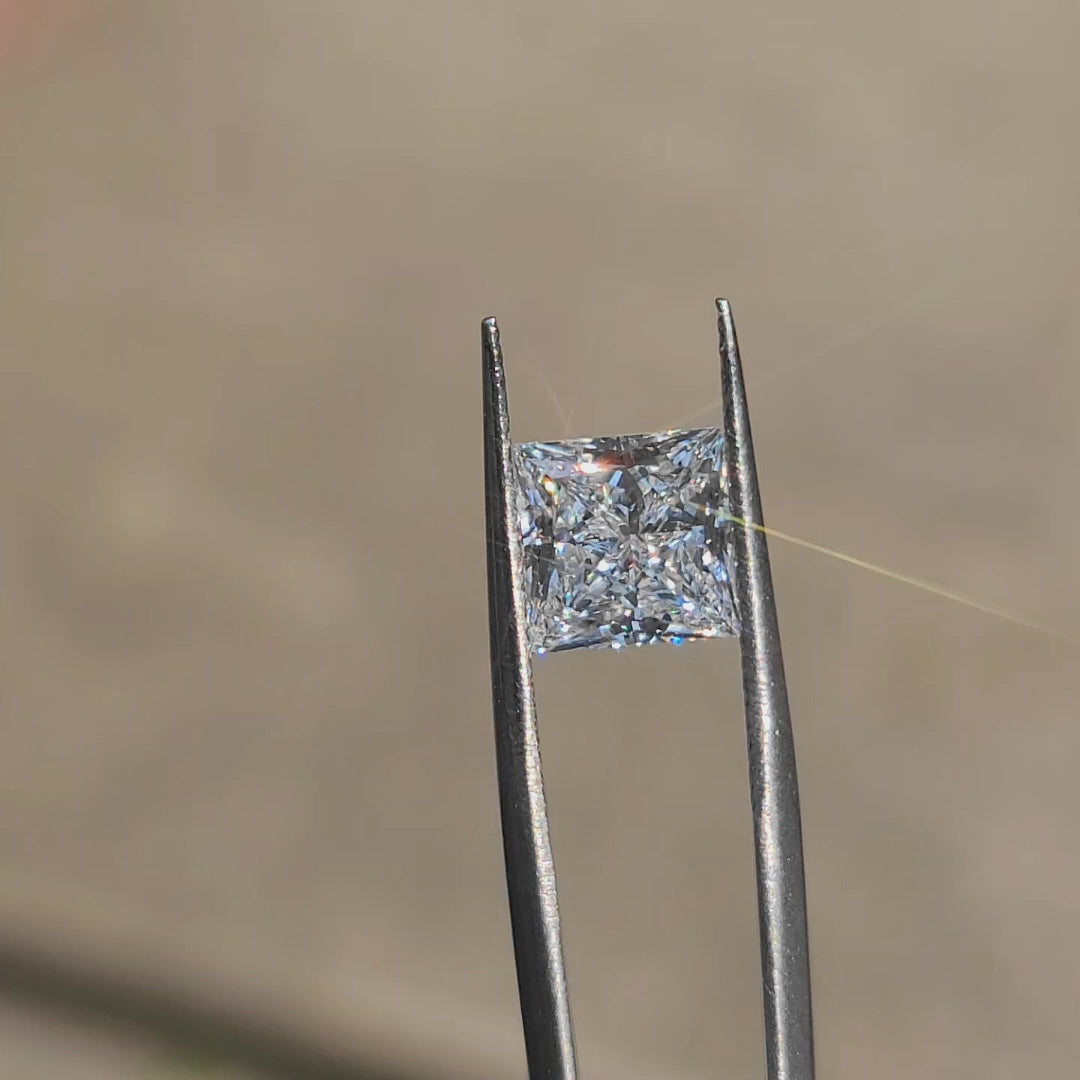 3.19ct princess lab diamond (D/VS1) outdoors, displaying maximum brilliance