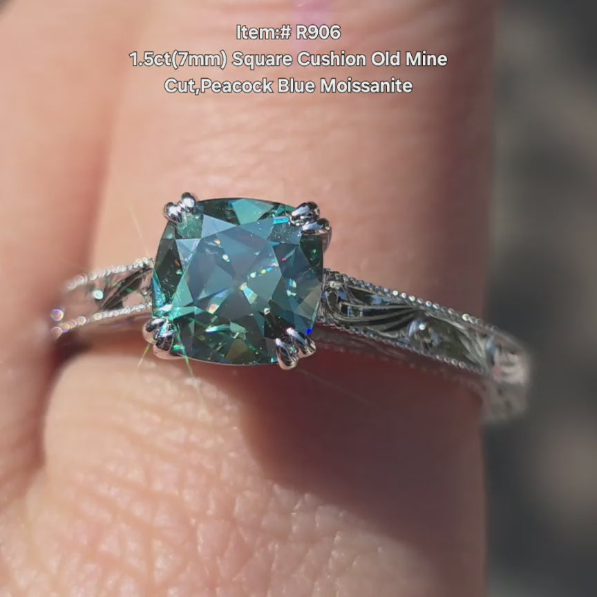  DovEggs Old Mine square cushion peacock blue moissanite ring sparkling in sunlight 