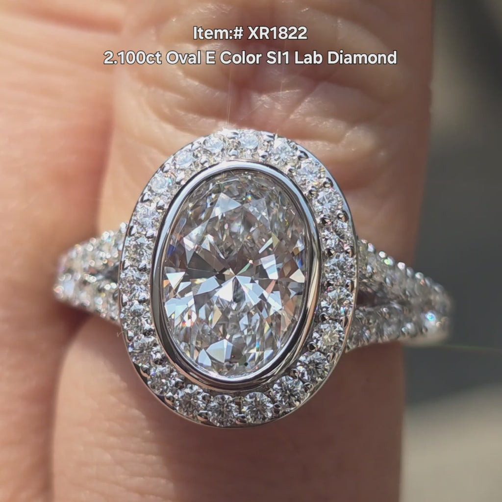 DovEggs Oval Brilliant cut lab grown diamond ring sparkling in sunlight video.