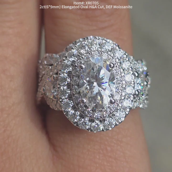 DovEggs DEF color H&A cut elongated oval moissanite engagement ring sparkling in sunlight video
