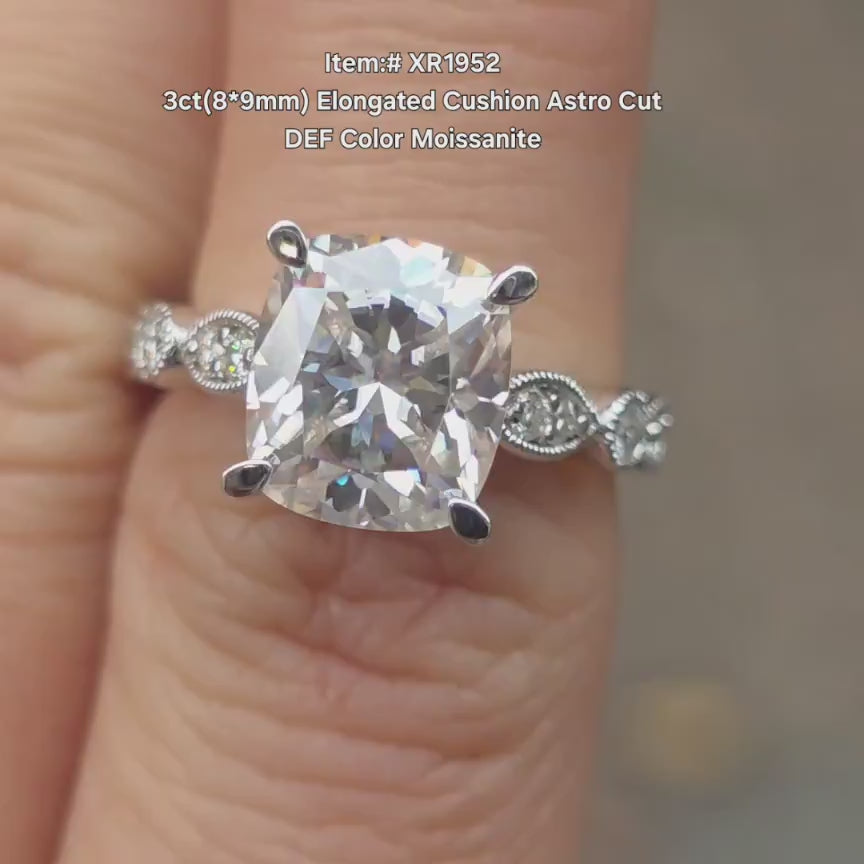 Elongated cushion astro cut moissanite with pave stones engagement ring video| DovEggs