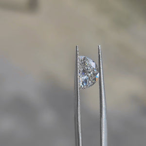Outdoor video of 1.050ct half-moon diamond's curved brilliance