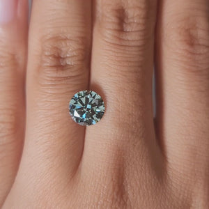 "Comparison video showing 2.00ct green diamond's color shift in different lighting"