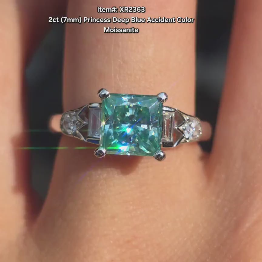 DovEggs princess art deco peacock blue moissanite engagement ring video in sunlight