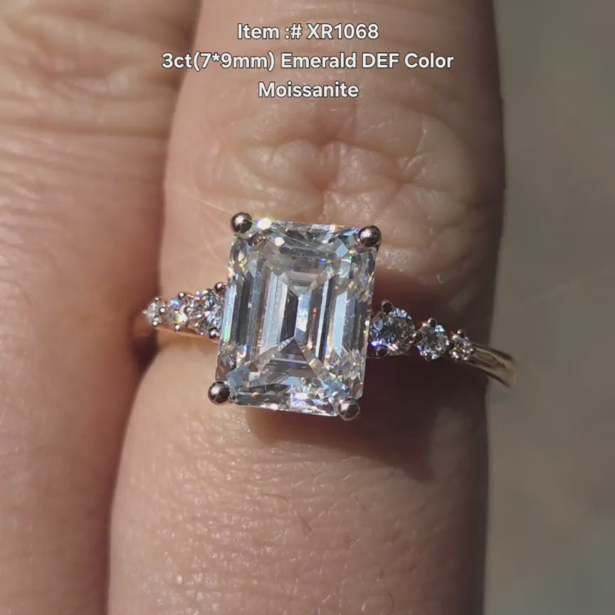 DovEggs DEF color emerald moissanite ring sparkling in sunlight video