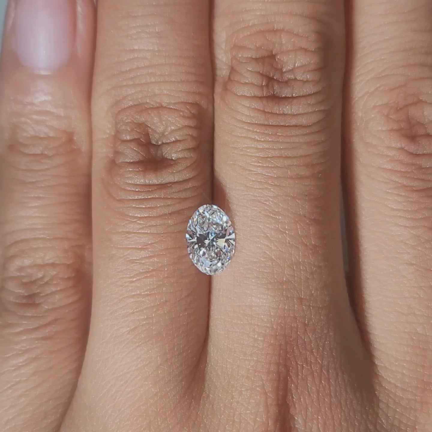 Modeled video of 1.01ct oval diamond under golden hour lighting