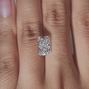 Hand-worn video of 3.290ct radiant diamond in warm interior lighting