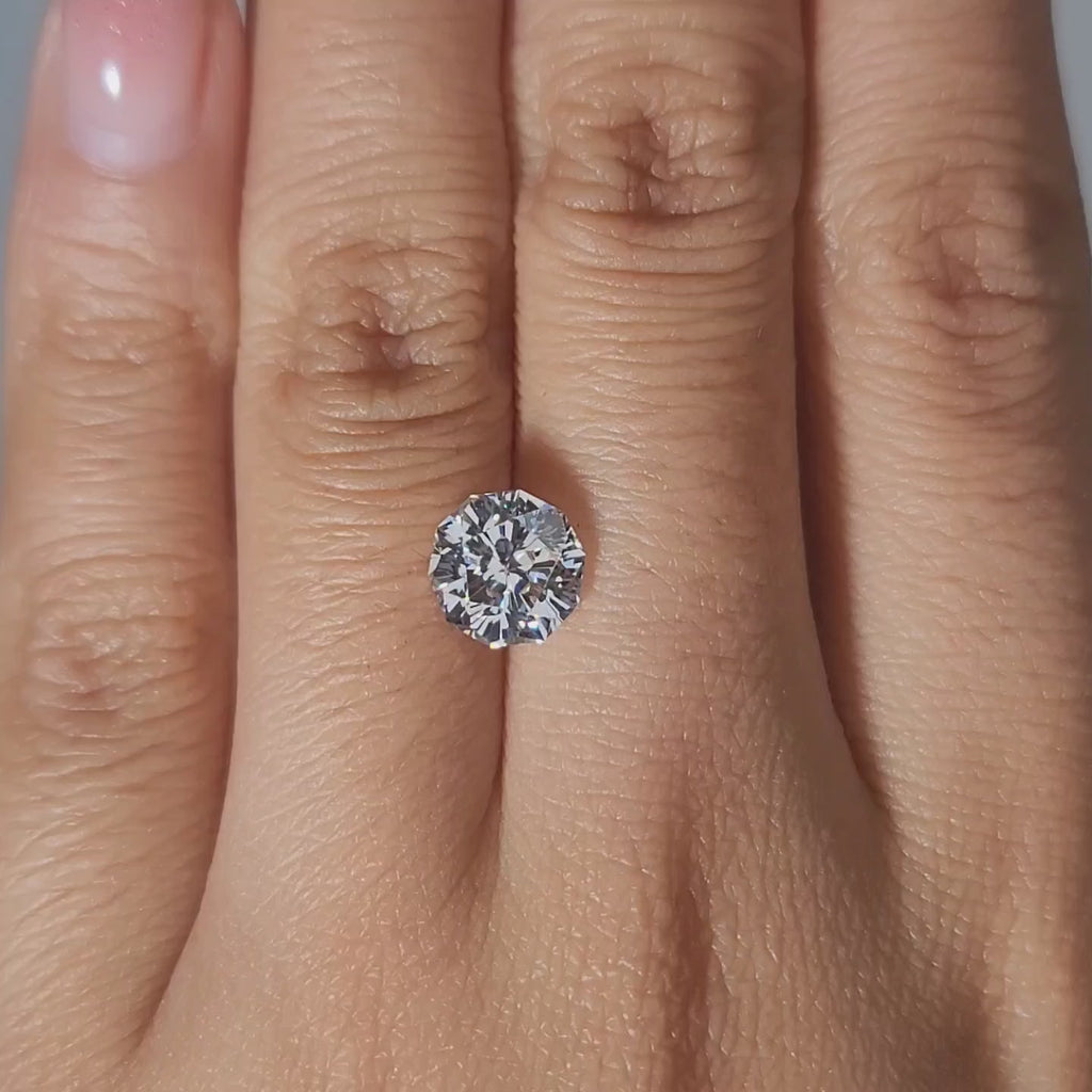 Side-by-side hand comparison with natural diamond