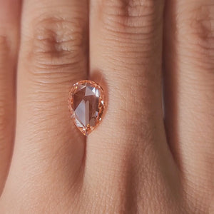 “Hand-worn video showing 2.21ct pink pear rose cut in romantic lighting"