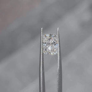 3.07ct radiant cut lab diamond sparkling in natural outdoor sunlight, showcasing G color and VS1 clarity