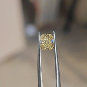 "Sunlit video showcasing 1.00ct radiant cut's vibrant yellow sparkle and crushed ice effect"