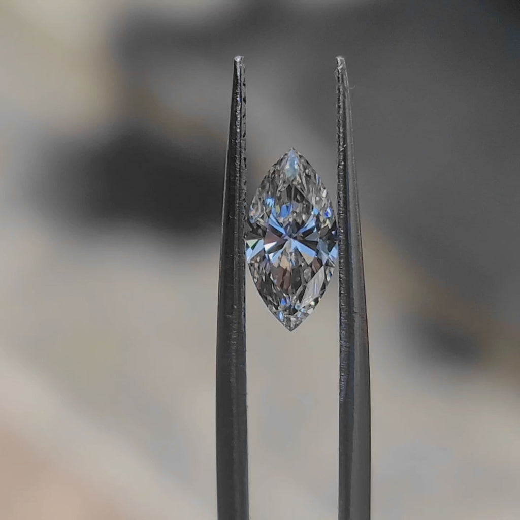 "Sunlight video showing 1.12ct marquise cut diamond's brilliant facets"