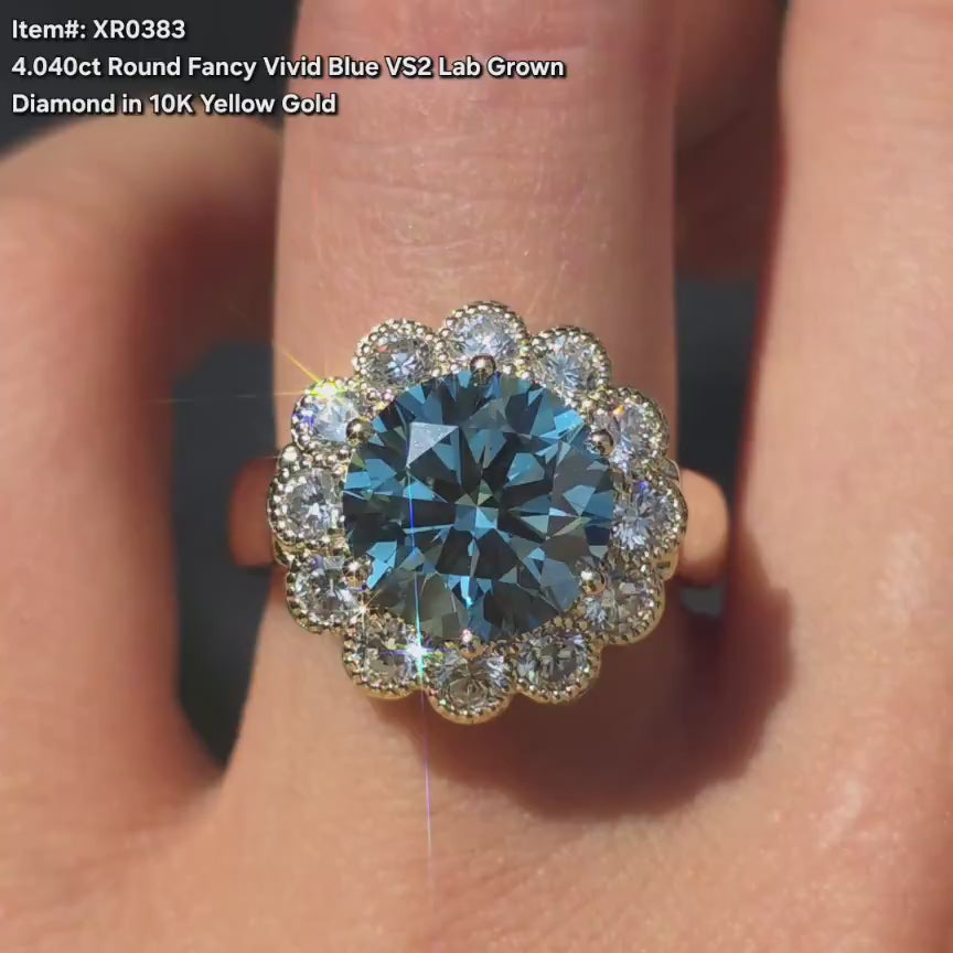 DovEggs round blue lab diamond flower halo engagement ring video in sunlight