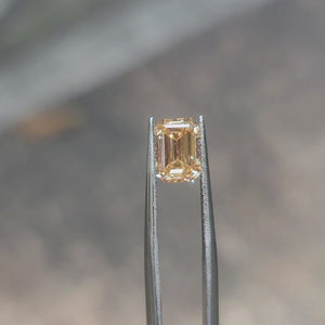 Sunlit video of 2.157ct emerald cut's vivid yellow saturation