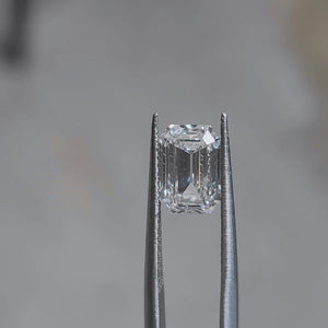 Sunlight video showcasing 2.682ct emerald cut E color VVS1 diamond's step-cut brillianc