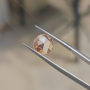 Sunlight video showcasing 2.53ct round rose cut's vivid pink hue and floral faceting"